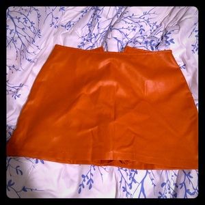 Fitted Orange Leather Mini Skirt